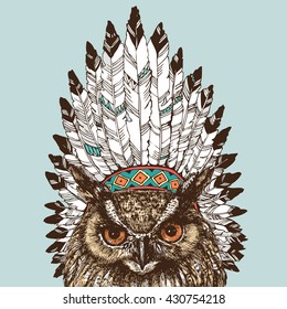 Eagle owl in an Indian headdress leader. Trendy fashion portrait. Hand drawn vector illustration.