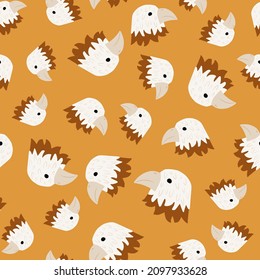 Eagle pattern seamless in freehand style. Head predator on colorful background. Vector illustration for textile prints, fabric, banners, backdrops and wallpapers.