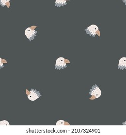 Eagle pattern seamless in freehand style. Head predator on colorful background. Vector illustration for textile prints, fabric, banners, backdrops and wallpapers.