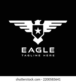 eagle silhouette logo design with shield and star
