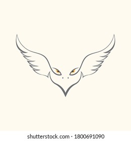 Ala águila volando y cabeza con el ojo furioso.