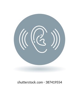 Ear hearing aid icon. Volume increase sign. Ear audio hear symbol. White icon on cool grey circle background. Vector illustration.
