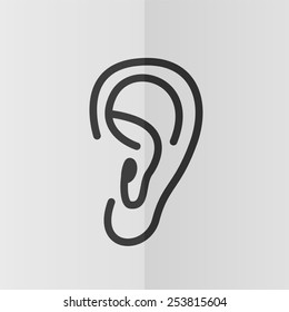 Ear vector icon. Effect of folded paper. Flat design
