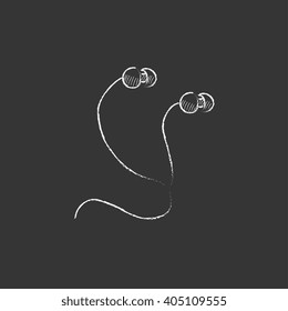 Earphone. Drawn in chalk icon.