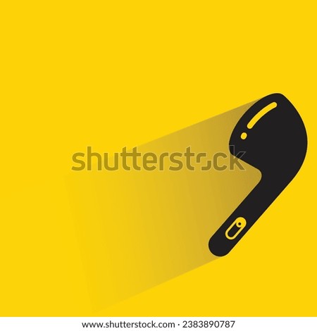 earphone with shadow on yellow background