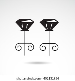 Earrings icon on white background. Vector art.