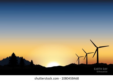 Earth day concept design. Wind mill placed on the hill with sunset as background, silhouette style.