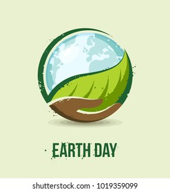 Earth Day concept. Hand holding a leaf and earth