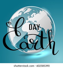 Earth Day poster with title.  Save environment green concept. Glass lens with map of the globe. Lettering, with a thin feather.  Vector 10 eps. 