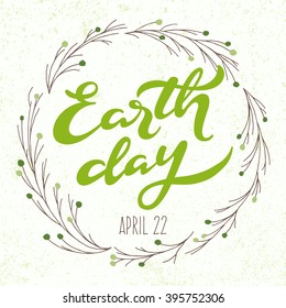 Earth day vector; hand drawn lettering with wreath of branches; calligraphic poster with handwritten text