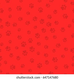 The earth dog. A pattern of canine tracks of different sizes. Traces of the dog are red. Vector illustration in a flat style