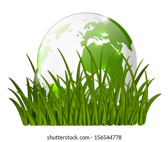 Earth globe on green grass