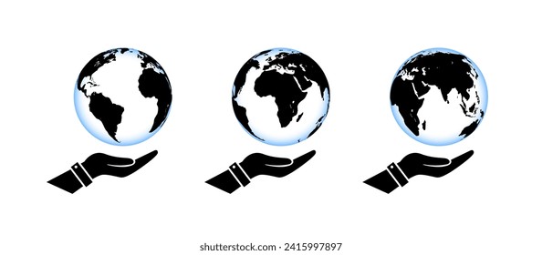 El globo terrestre en manos. Iconos del vector