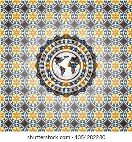 earth icon inside arabic style badge. Arabesque decoration.
