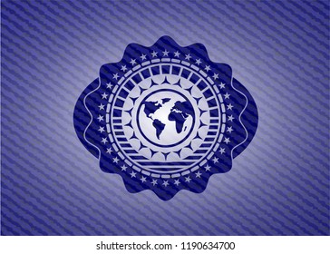 earth icon inside badge with denim background