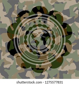 earth icon inside camouflage emblem