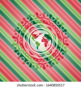 earth icon inside christmas badge background.