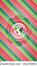 earth icon inside christmas colors style emblem.