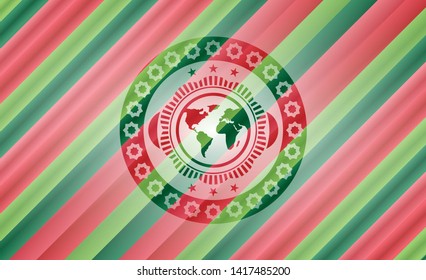 earth icon inside christmas emblem.