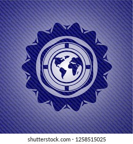 earth icon inside emblem with jean background