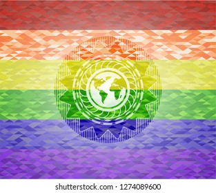 earth icon inside emblem on mosaic background with the colors of the LGBT flag