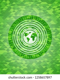 earth icon inside green emblem with mosaic ecological style background