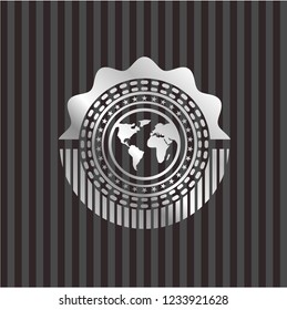 earth icon inside silver emblem