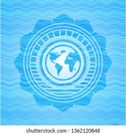 earth icon inside sky blue water wave emblem background.