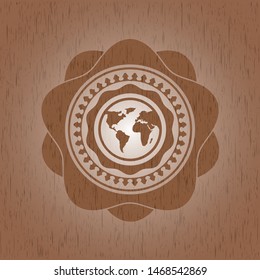 earth icon inside wooden emblem. Retro