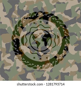 earth icon on camouflaged pattern
