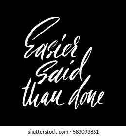 Easier said than done. Hand drawn lettering proverb. Vector typography design. Handwritten inscription.