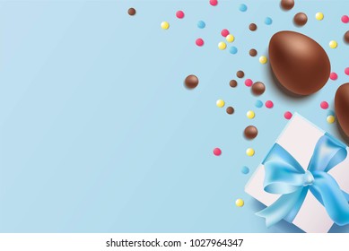 Easter background with chocolate eggs, gift box and candy on blue background. Vector illustration