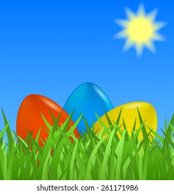 Easter background with colorful eggs in grass