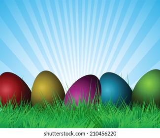 Easter background with colorful eggs on green luscious grass