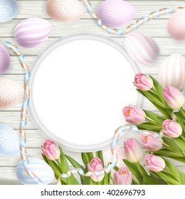 Easter background. Colorful eggs over white wooden background with frame. EPS 10 vector file included