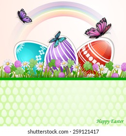 Easter background with Easter eggs and butterfly on flowers