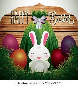 Easter background with eggs in grass and bunny. Have yourself a very Happy Easter.