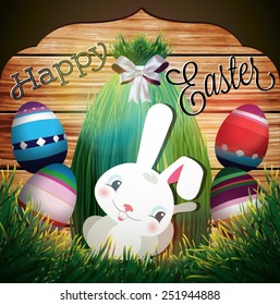 Easter background with eggs in grass and bunny. Happy Easter. 