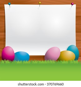 An Easter background with eggs, grass, wooden wall, and paper for copy. Vector EPS 10 available. EPS file contains transparencies and gradient mesh.