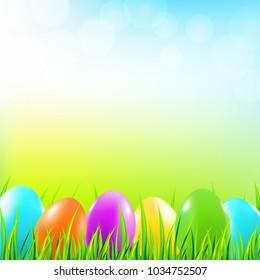 Easter background with grass and colorful eggs. Vector illustration.