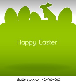 Easter background. Green page with silhouette of eggs and bunny.