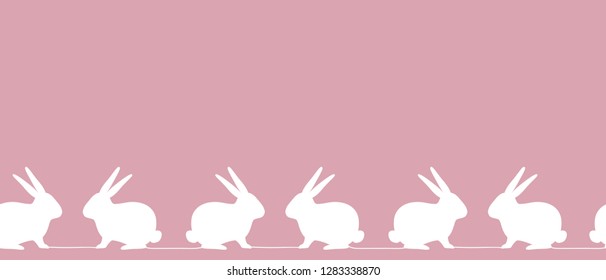 Easter background. Seamless border with white Easter bunnies on a pink background. Vector illustration