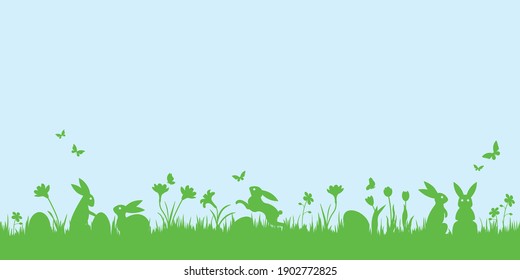 Easter banner with bunnies, flowers and easter eggs on a green meadow. Panoramic vector illustration with butterflies in blue sky.