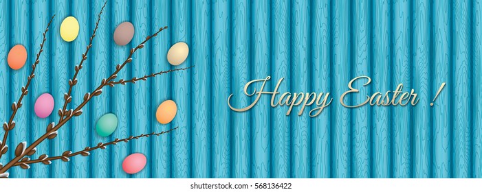 Easter banner with pussy-willow branch and eggs on wooden table