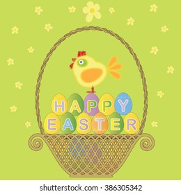 Easter basket with colored eggs and chicken