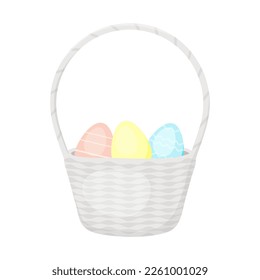 Easter basket with eggs yellow blue and pink