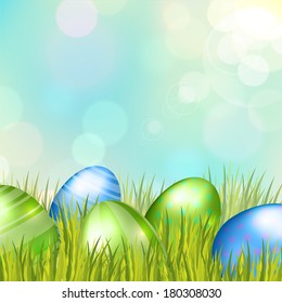 Easter bokeh background with eggs on meadow of blue colors. Vector eps10.