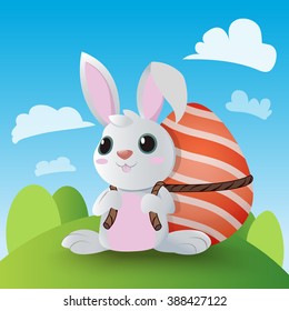 Easter bunnies and egg in field