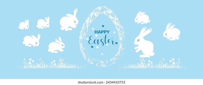 Easter bunnies and egg on a light blue background with grass and flowers