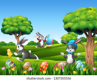 Easter bunnies and easter egg on the nature